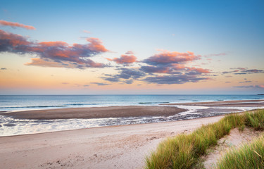Wall Mural - druridge bay sandy beach near sunset / druridge bay is a seven mile long beach in northumberland bet