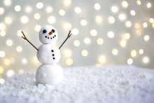 Merry Christmas And Happy New Year Greeting Card With Copy-space.Happy Snowman Standing In Winter Christmas Landscape.Snow Background