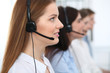 © rogerphoto - Call center. Beautiful cheerful smiling operator consulting clients with headset. Business concept of customer service