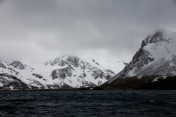 ice in the Antarctica with iceberg in the ocean