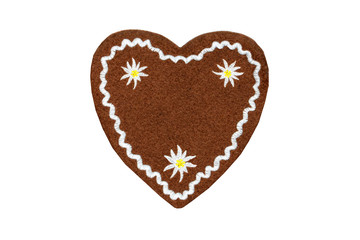 Wall Mural - textile Gingerbread heart shape valentines day gift with copy space on white isolated background.