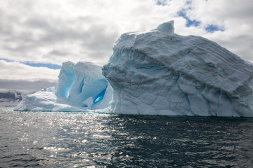 ice in the Antarctica with iceberg in the ocean