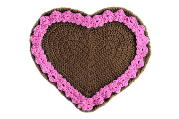 Wall Mural - hand crochet Gingerbread heart shape valentines day gift with copy space on white isolated background.