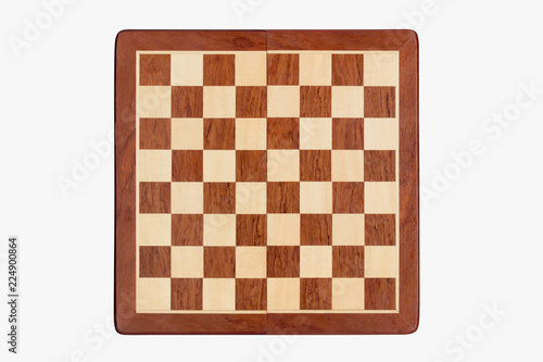 Fotografía empty wooden chessboard isolated on white background, top view