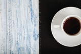 Fototapeta Mapy - cup of coffe on wooden table