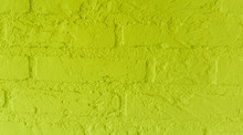 Modern Neon Yellow Stone Brick Wall With Big Bricks Close Up Background Pattern