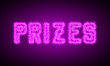 PRIZES - pink glowing text at night on black background