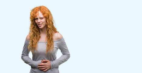 Poster - Young redhead woman with hand on stomach because indigestion, painful illness feeling unwell. Ache concept.