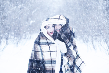 Beautiful girl in a beautiful winter snow