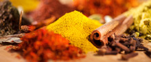 Spice. Various Indian Spices And Herbs Colorful Background. Assortment Of Seasonings, Condiments