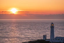 Sunset At South Stack Lighthouse On Anglesey In Wales