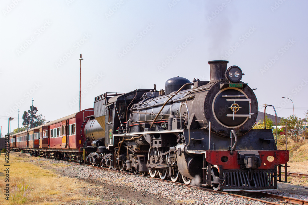 old steam locomotive in station - obrazy, fototapety, plakaty 
