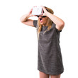 © luismolinero - Middle-age blonde woman using VR glasses. Virtual reality experience on isolated white background