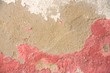 © Khathawuth - red color on cement texture and background