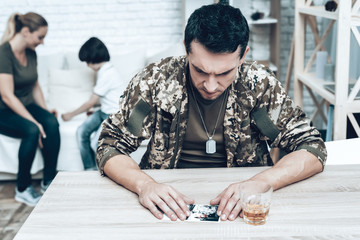 Wall Mural - Man Is Drinking Alcohol. Depression After War.