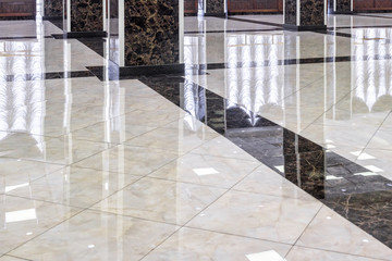 Clean shiny marble floor in commercial office, cleaning service concept