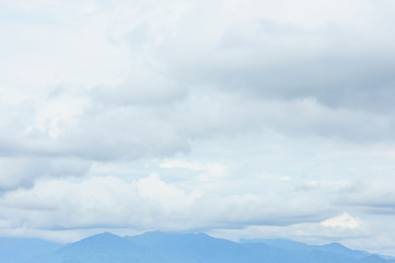 Blue sky in more cloud day with mountain range and abstract background.