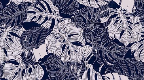 Floral seamless pattern, blue and light pink split-leaf Philodendron plant on...