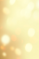 Wall Mural - gold festive christmas background. beautiful abstract twinkled bright background with bokeh defocuse