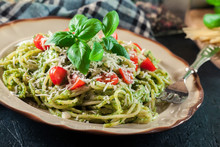 Vegetarian Pasta Spaghetti With Basil Pesto And Cherry Tomatoes