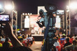 © tuaindeed - Professional digital camera recording video in music concert festival