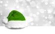 Green Christmas Cap on white Board