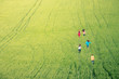 girls running in a field