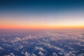 Wall Mural - flying above the clouds. aerial view from the airplane