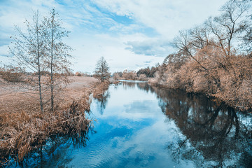 Fototapete - autumnal beautiful landscape, blue sky and autumn trees with reflection in the river