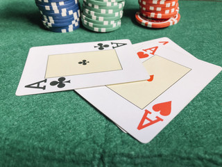 cards and chips poker table game green