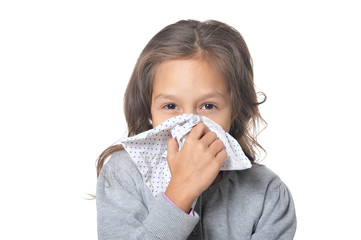 Poster - Portrait of sick little girl holding handkerchief