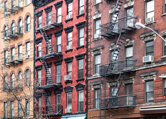 Fototapete - Buildings along Carmine Street in the Greenwich Village neighborhood of Manhattan, New York City