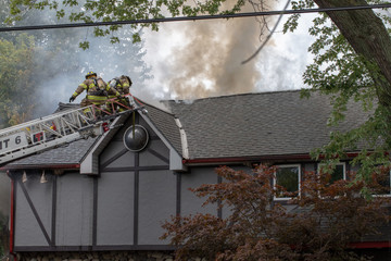 Canvas Print - Firefighting Home Fire