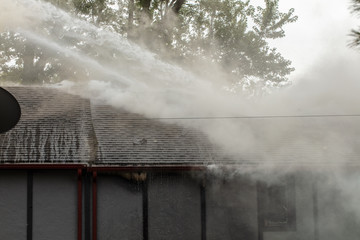 Canvas Print - Firefighting Home Fire