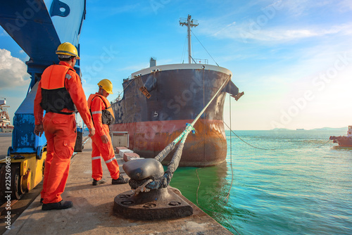 Fotografie, Obraz ship vessel is on leaving departure from the port terminal after completion of l