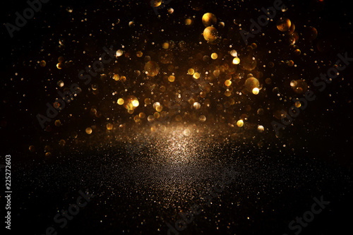 glitter vintage lights background. black and gold. de-focused. Obraz na płótnie