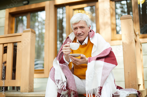 Content Handsome Gray Haired Senior Man Covered With Blanket