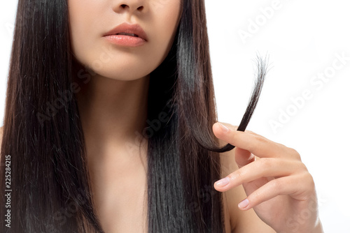 Cropped Shot Of Woman With Damaged Dark Hair Isolated On White