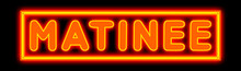 Matinee - Glowing Text On Black Background
