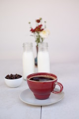 Wall Mural - coffee cup with milk on table