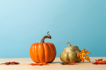 Wall Mural - Collection of autumn pumpkins on a blue background