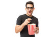© AntonioDiaz - Scared Young Man Wearing 3D Glasses While Having Popcorn