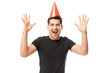 © AntonioDiaz - Young Man Wearing Party Hat While Enjoying Birthday Party