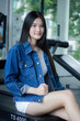 © tiniroma - Portrait of thai adult beautiful girl blue jeans relax and smile