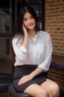 © tiniroma - Portrait of thai adult uniform office girl calling smart phone