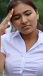 © dtiberio - Hispanic Teenage Female With Headache Orig