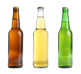 Poster - Set with different cold beer bottles on white background