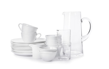 set of clean tableware on white background. washing dishes