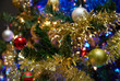 © maxdigi - Ornaments on a Christmas Tree. Medium shot of decorations on a Christmas tree.