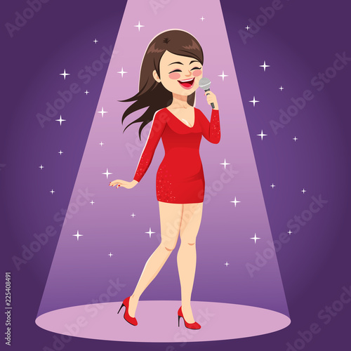 Fotografía Beautiful woman in red trendy fashion dress singing on stage under spotlight